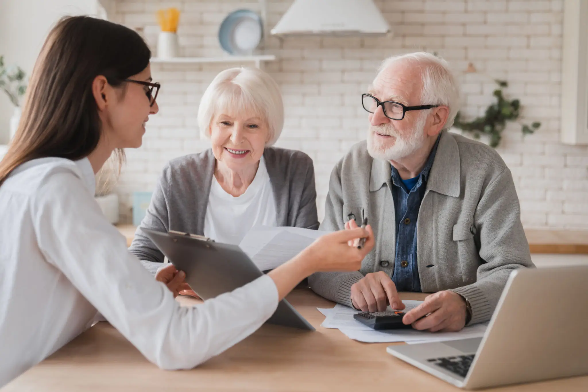 A doctor consulting with elderly patients in a clinic.